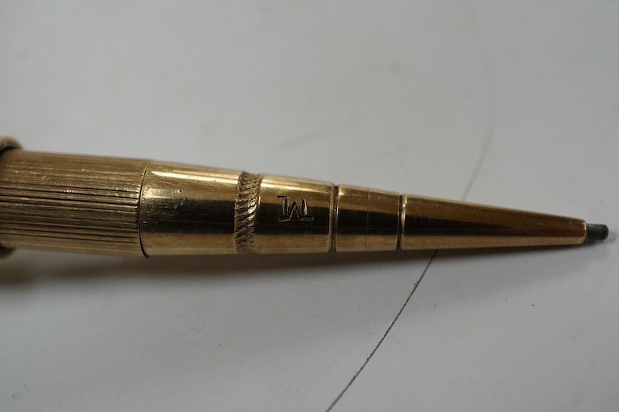 A George V 9ct gold cased propelling pencil by Sampson Mordan & Co, London, 1928. Condition - fair to good